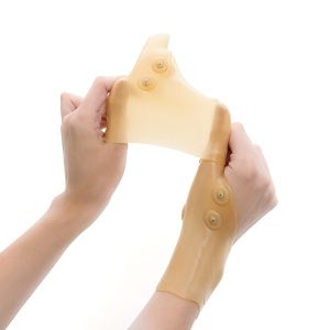 Стабилизираща силиконова ортеза при болки в палеца и китката с магнитни точки